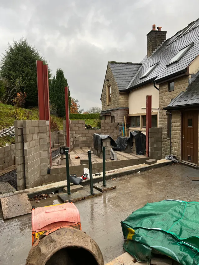 Structural steelwork against the existing roofline