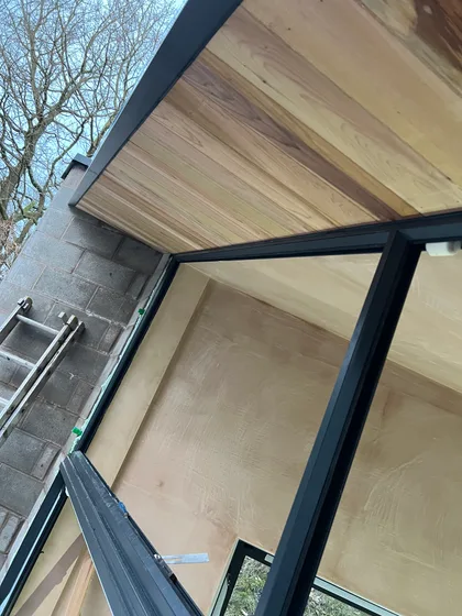 Roof and glazing enclosed