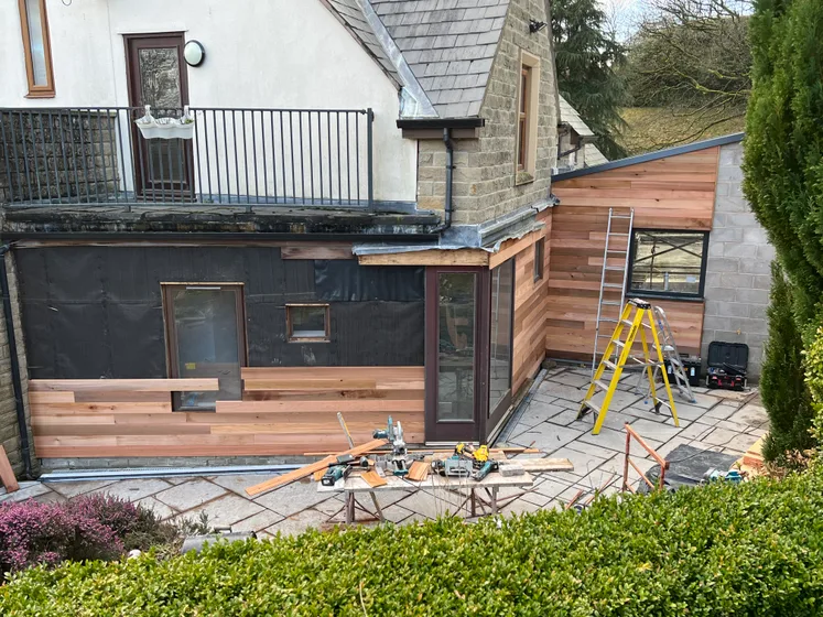 Cedar cladding installation
